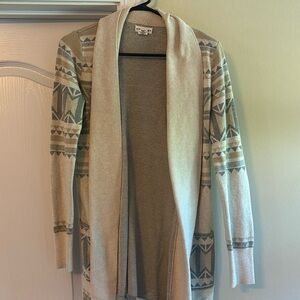 Cream, light weight, never worn cardigan